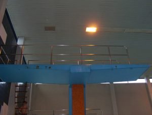 concrete diving board in need of repair