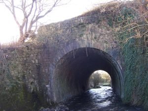 stone bridge in need of structural repairs