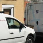 asrs vans outside property undergoing structural repairs