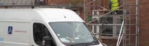 banner image showing asrs van outside property undergoing structural repairs