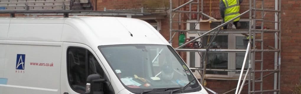 banner image showing asrs van outside property undergoing structural repairs