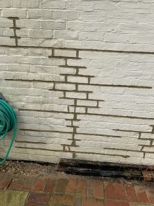 Cracks repaired in brick wall